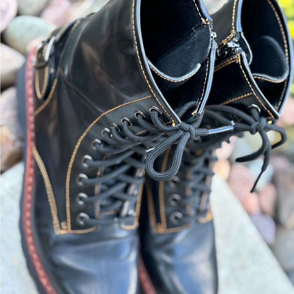 Gently used Size 10 Black Leather Women’s Boots that zip up the side.